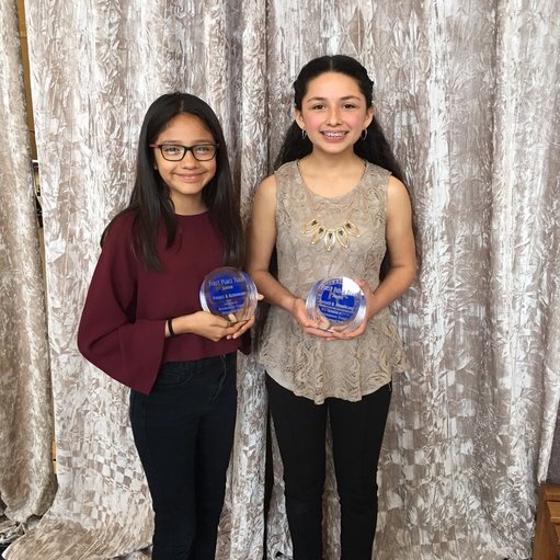 PictureScience Festival winners with their trophies.  Viviana Calderon on the left; Yulissa Cabrera on the right.